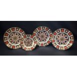 A Royal Crown Derby 1128 Imari pattern dessert plate, first quality; another pair,