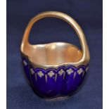 A Coalport miniature blue and gilt basket