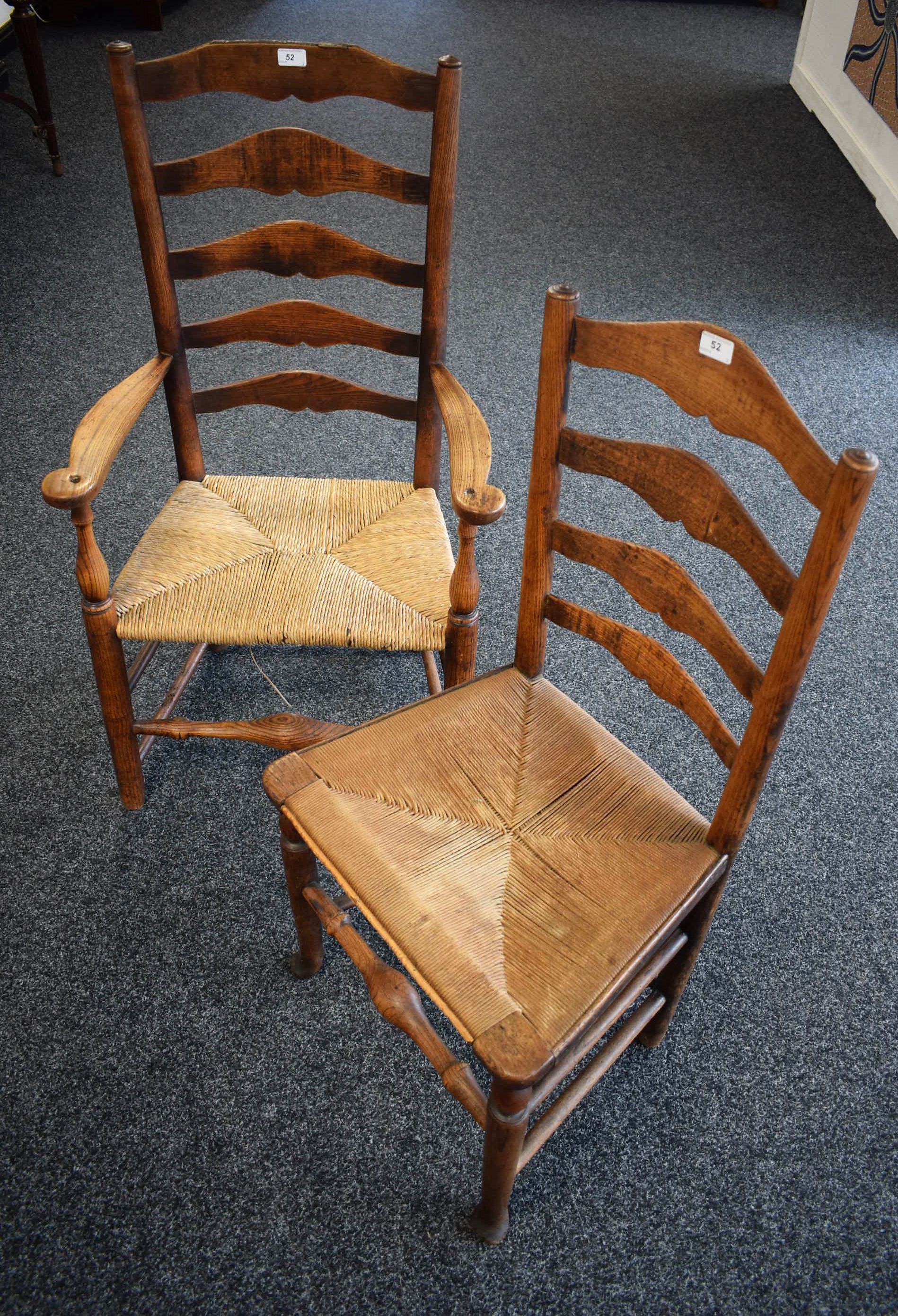 A Victorian oak rush seated chair; another,