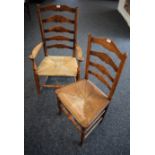 A Victorian oak rush seated chair; another,
