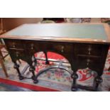 A 20th century oak writing desk,