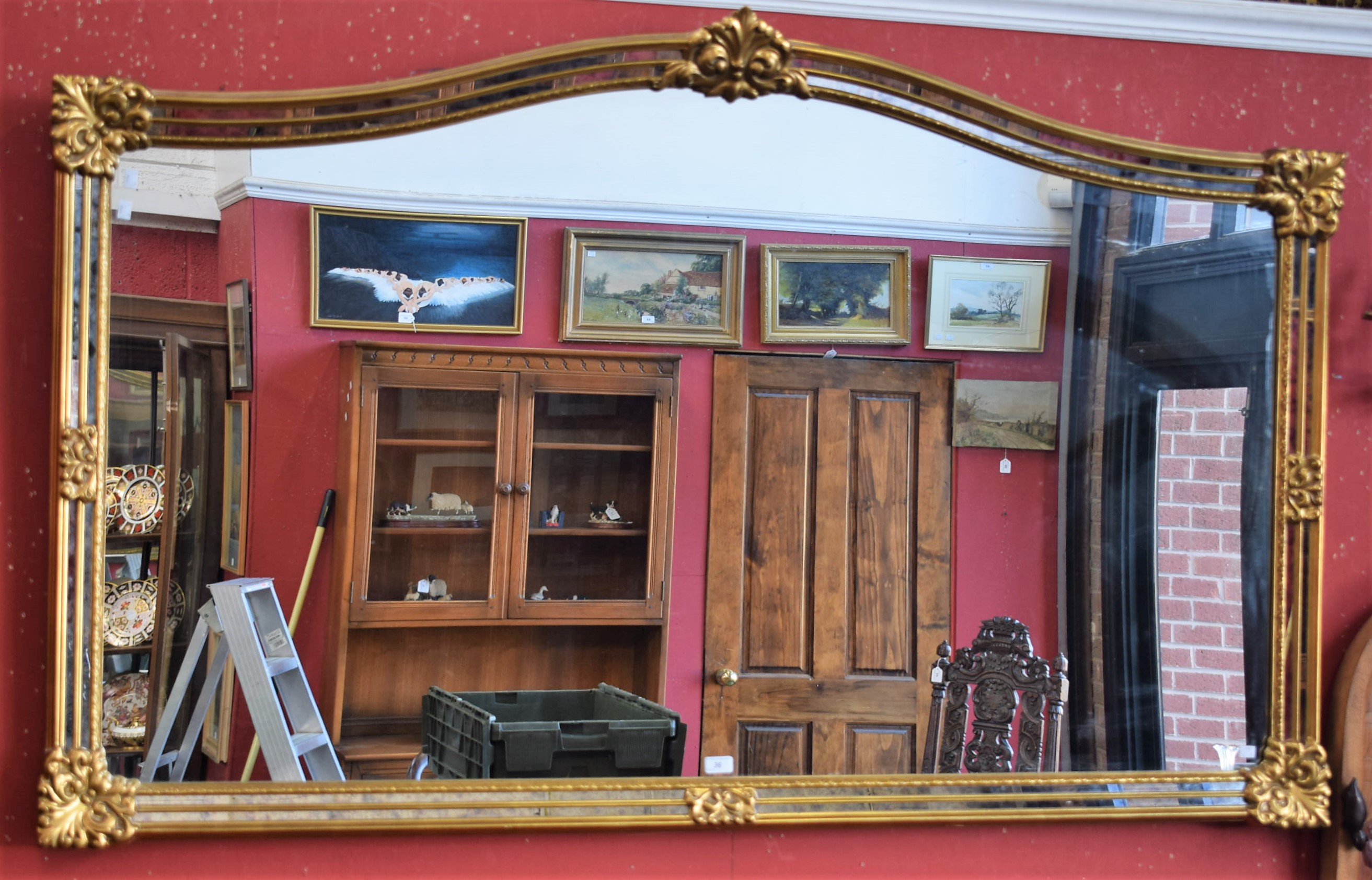 A large 'gilt' framed wall mirror,