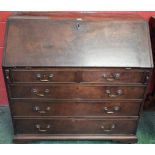 A George III mahogany bureau, fall front enclosing a fitted interior,