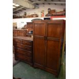 A 20th century oak chest of two short over three long drawers,