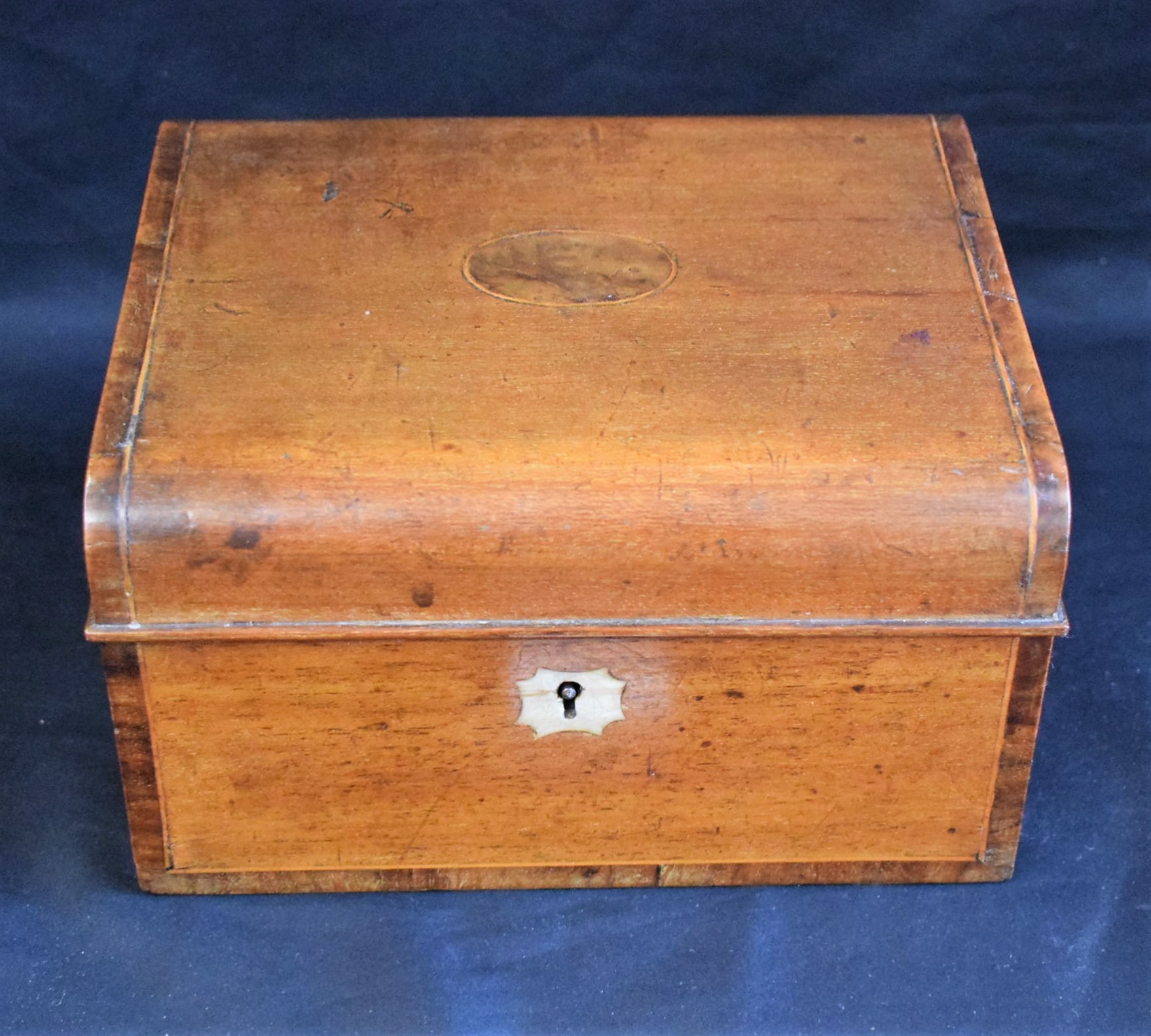 A Victorian crossbanded mahogany workbox,