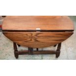 An oak dropleaf occasional table,