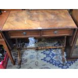 A reproduction mahogany sofa table, moulded top above two short drawers, turned stretcher,