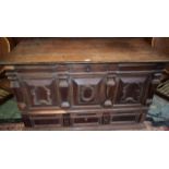 A 17th/early 18th century oak mule chest, hinged rectangular top,