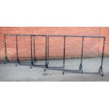 A set of five tubular metal retailer's clothing rails (5)