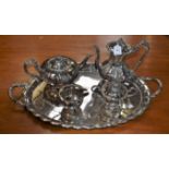 A Cavalier silver plated hand chased four piece tea service, comprising tea pot, coffee pot,