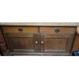 A 20th century pine kitchen sideboard,