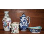 A 19th century Chinese blue and white wine jug and cover; a Famille Rose vase; a similar teapot;