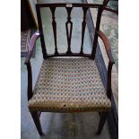 A George III mahogany side chair, pierced and carved splat, stuffed over upholstery,