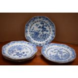 A set of six Chinese octagonal plates, painted in underglaze blue with storks, pine tree and fence,