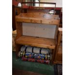 A 20th century pine desk, shaped three quarter gallery above three short drawers, a large niche,