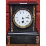 A late 19th century slate mantel clock,