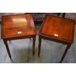 A pair of reproduction mahogany occasional tables,