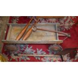 A mid 20th century child's pull-a-long cart, inscribed Air Flow,