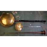 A Georgian cream skimmer; a copper and brass warming pan;