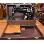 An early 20th century Singer sewing machine,