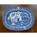 A Victorian Staffordshire Willow pattern blue and white meat platter