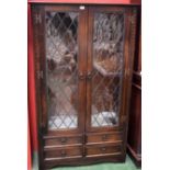 An oak Jaycee Furniture display cabinet,