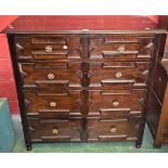 An early 20th century oak chest of drawers