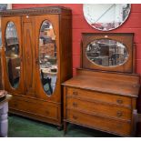 A 20th century oak two piece bedroom suite,