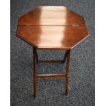 An Edwardian 'campaign' folding mahogany low occasional table, c.