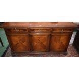 A 20th century mahogany and marquetry sideboard,