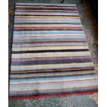 A hand made rug, Multistripe, retailed by John Lewis,