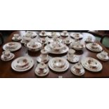 A Royal Albert Centennial Rose pattern part dinner and tea set, comprising dinner plates,
