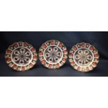 A Royal Crown Derby 1128 shaped circular plate, 22cm diam, first quality; a pair similar,