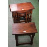 A nest of three oak Old Charm tables;
