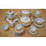 A retro 1960's Eschenbach German green and orange spot bonded part tea/coffee service,