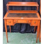 An Edwardian mahogany writing desk, of small proportions,