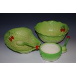 A Beswick cabbage leaf salad bowl; another; kidney shaped; two salad serving spoons (af);