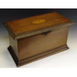 An Edwardian mahogany sewing box, hinged cover inlaid with an oval batwing patera,