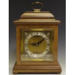 A Mappin & Webb Limited mantle clock, by Elliott Clocks, walnut case, silvered brass dial,