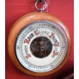 A circular aneroid barometer, 21.