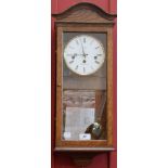 A John C Field golden oak wall clock, Westminster chime, key, pendulum, original receipt for £470,