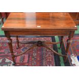 A 19th century rosewood card table, hinged top enclosing a baize lined playing surface,