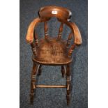 A Victorian elm child's high chair, shaped cresting rail, turned legs and supports, 79.