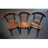 A set of three early 20th century bentwood chairs, label for Mundus,