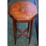 An early 20th century satinwood kettle/jardiniere stand, octagonal top painted with ribbons,