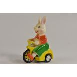 A Rosenthal plastic clockwork, Bunny on a tricycle,