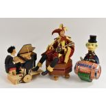 A wooden automaton, piano player; a clockwork automaton Jester, with a lute,