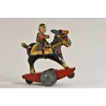 A Stubborn Ass mechanical wind-up Clown on a Donkey, by Peter Pan, made in England, original box, c.
