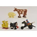 Shufflers/Ramp Walkers - a cow, brown and white markings, made in Hong Kong; two ducks,