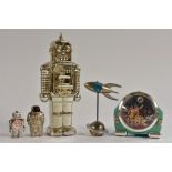 A mid 20th century novelty ceramic money box, as a Silver Robot,